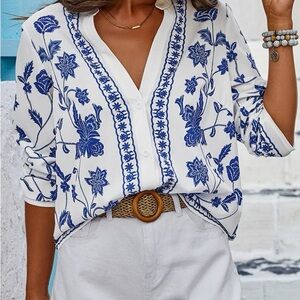 Blue Relaxed Blouse with Mandarin Collar and Embellished Sleeves